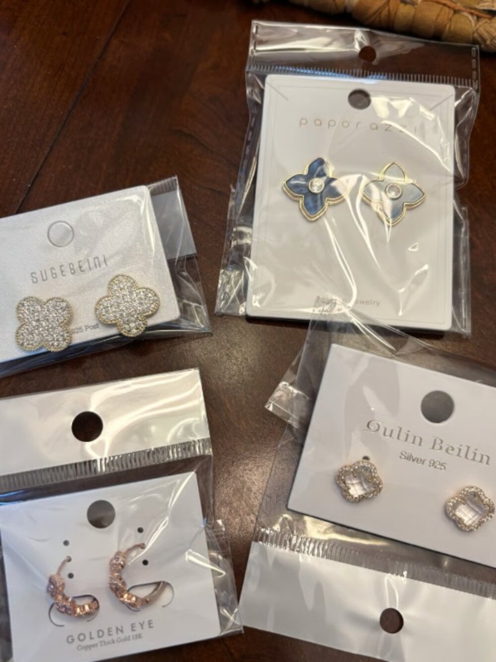 4 pairs of clover earrings